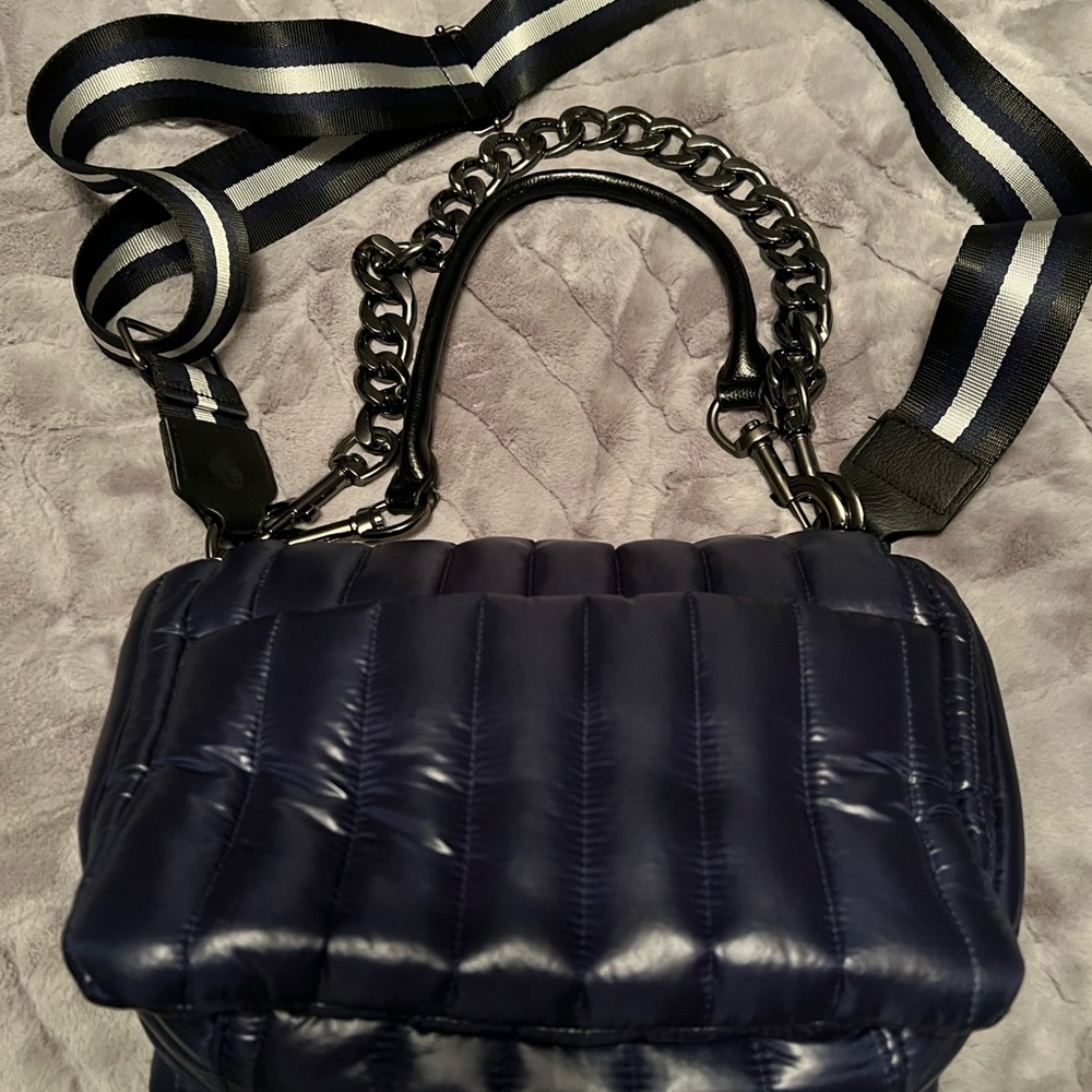 Navy blue think rolyn bar bag with 3 straps